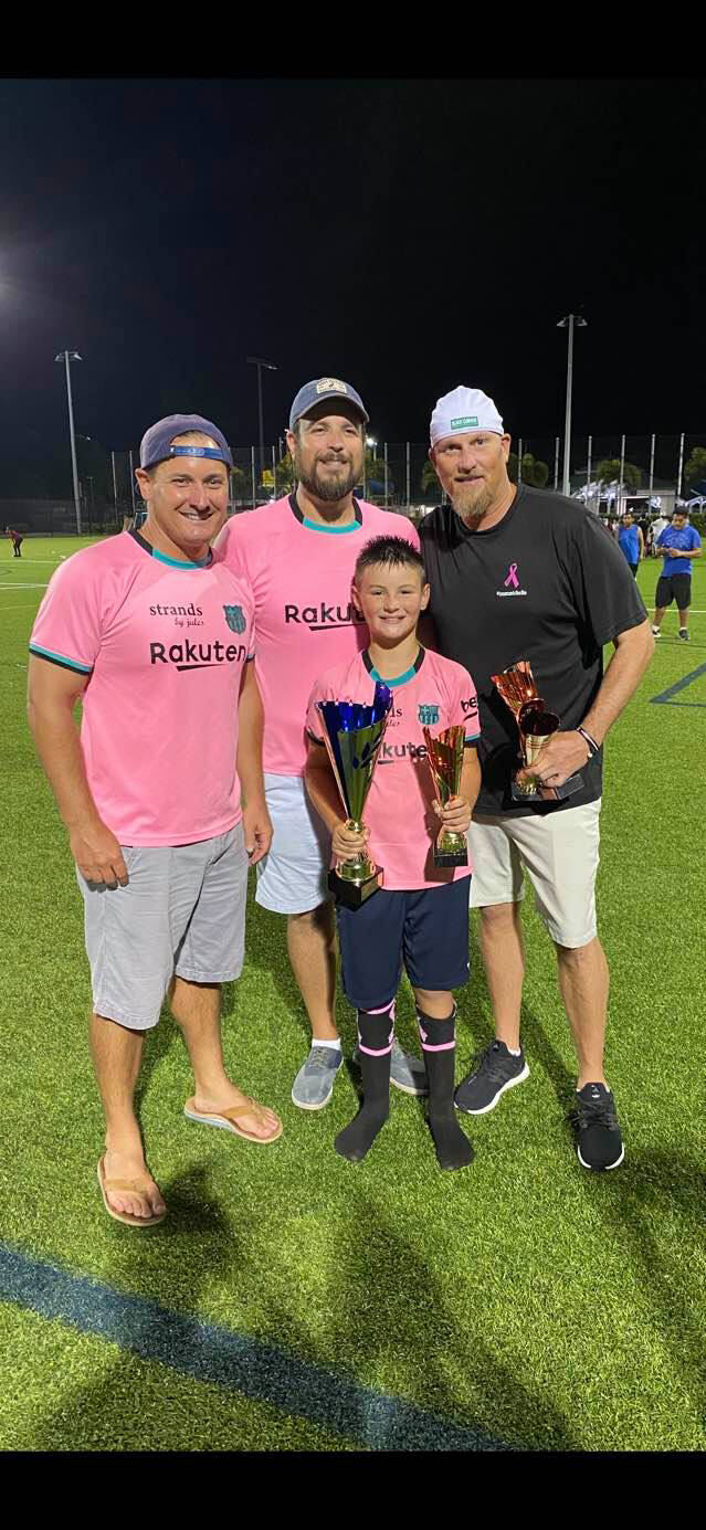 2. Coaches Jared Grifoni, Patrick Baldwin, and Matt Huneke with MVP goalie Rowen Banister.JPG